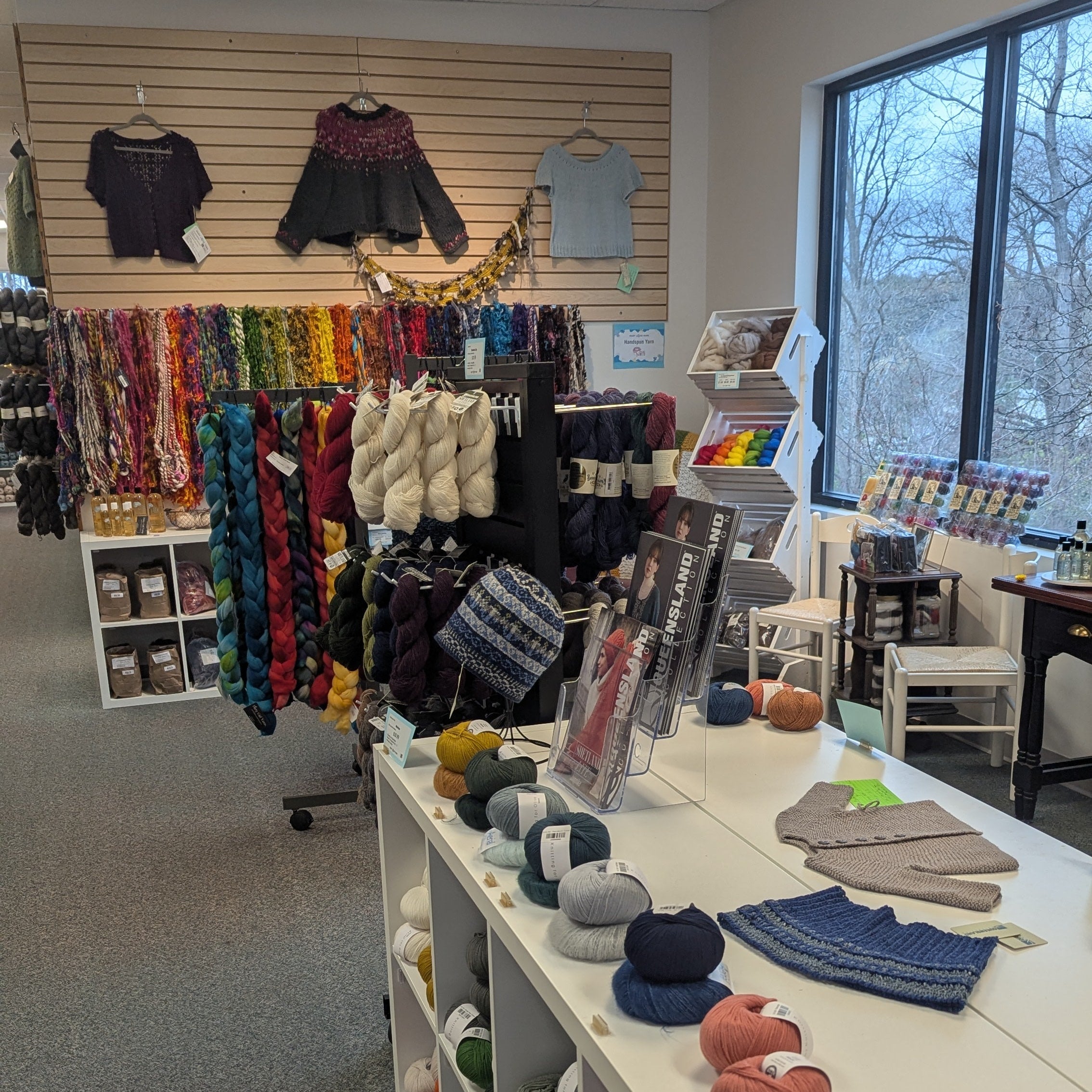 Store interior with yarn and knitting supplies on display